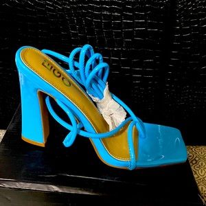 Bright blue lace up heels